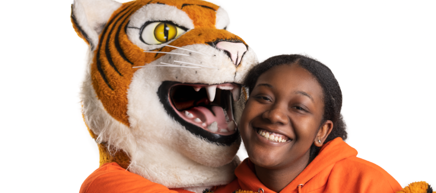 Bengal mascot with student